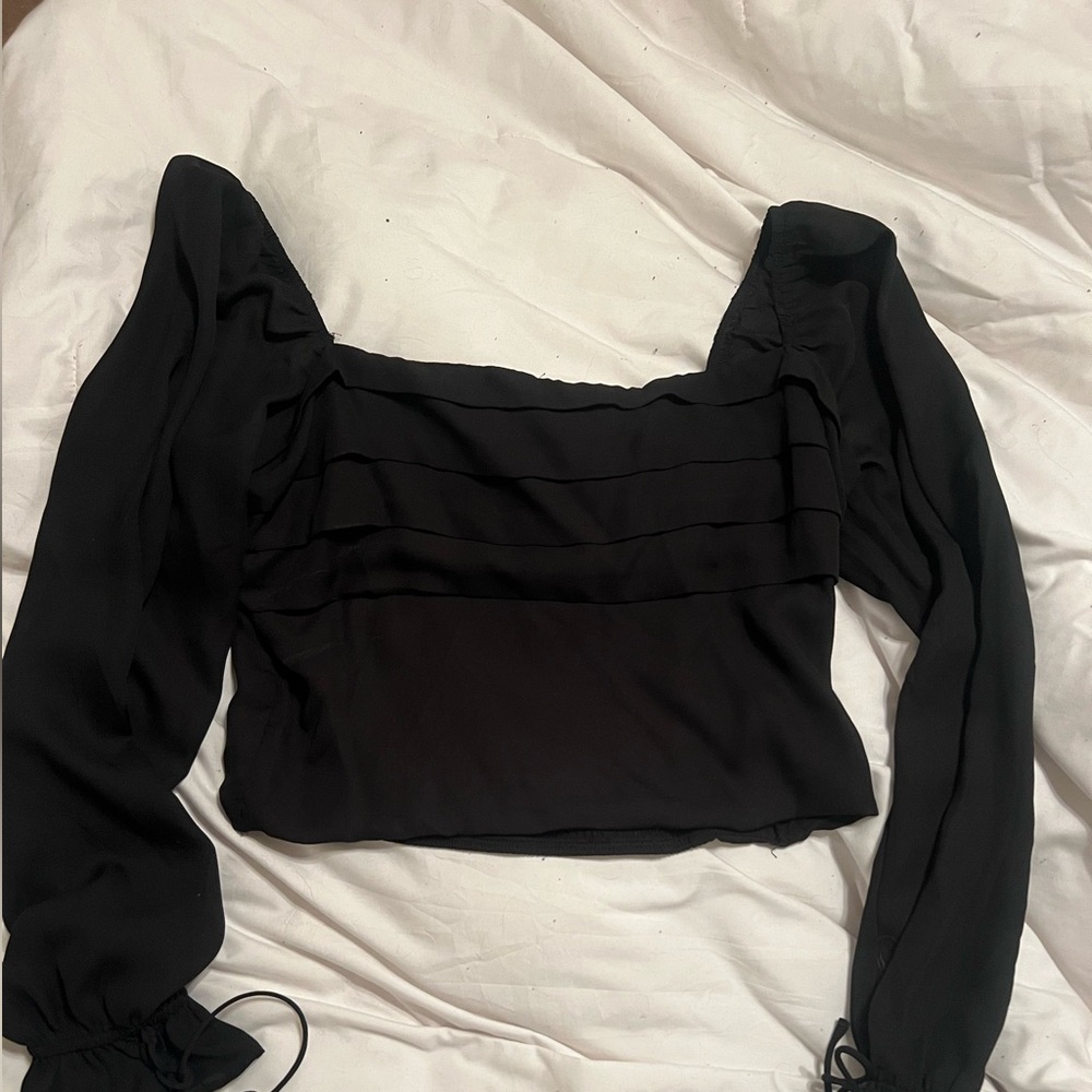 Francesca’s black top!